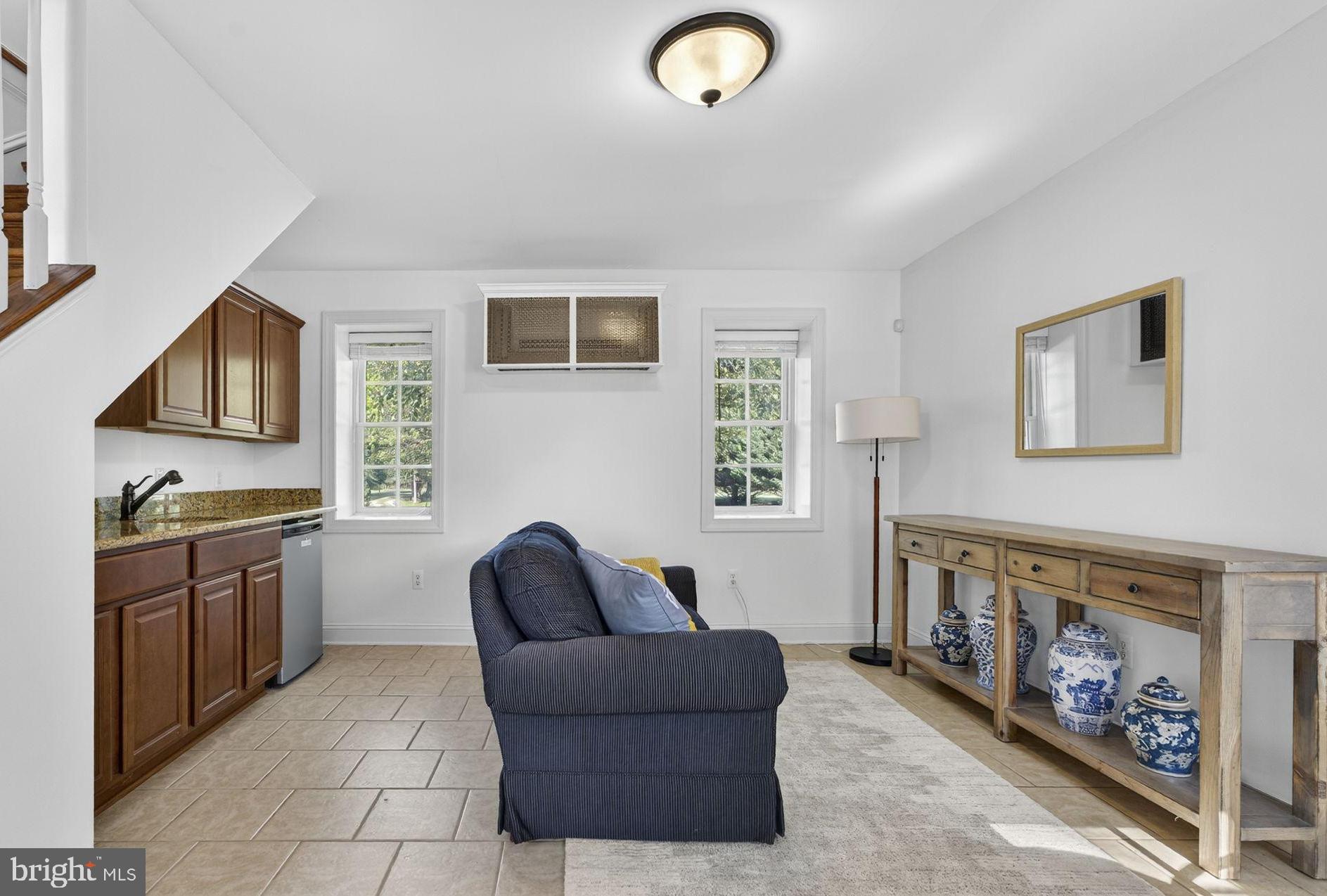 9533 Howellsville Road Boyce, VA 22620 - Photo 43 of 65 a living room with furniture and a window