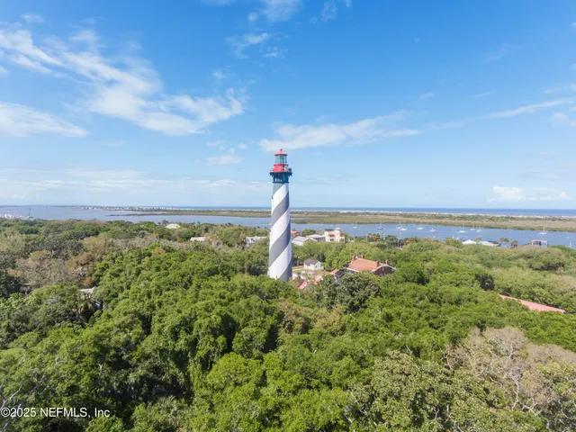 a view of swimming pool with outdoor seating and deck