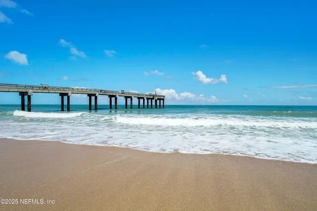 a tall building sitting on the side of a street