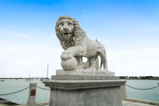 a view of a building with potted plants