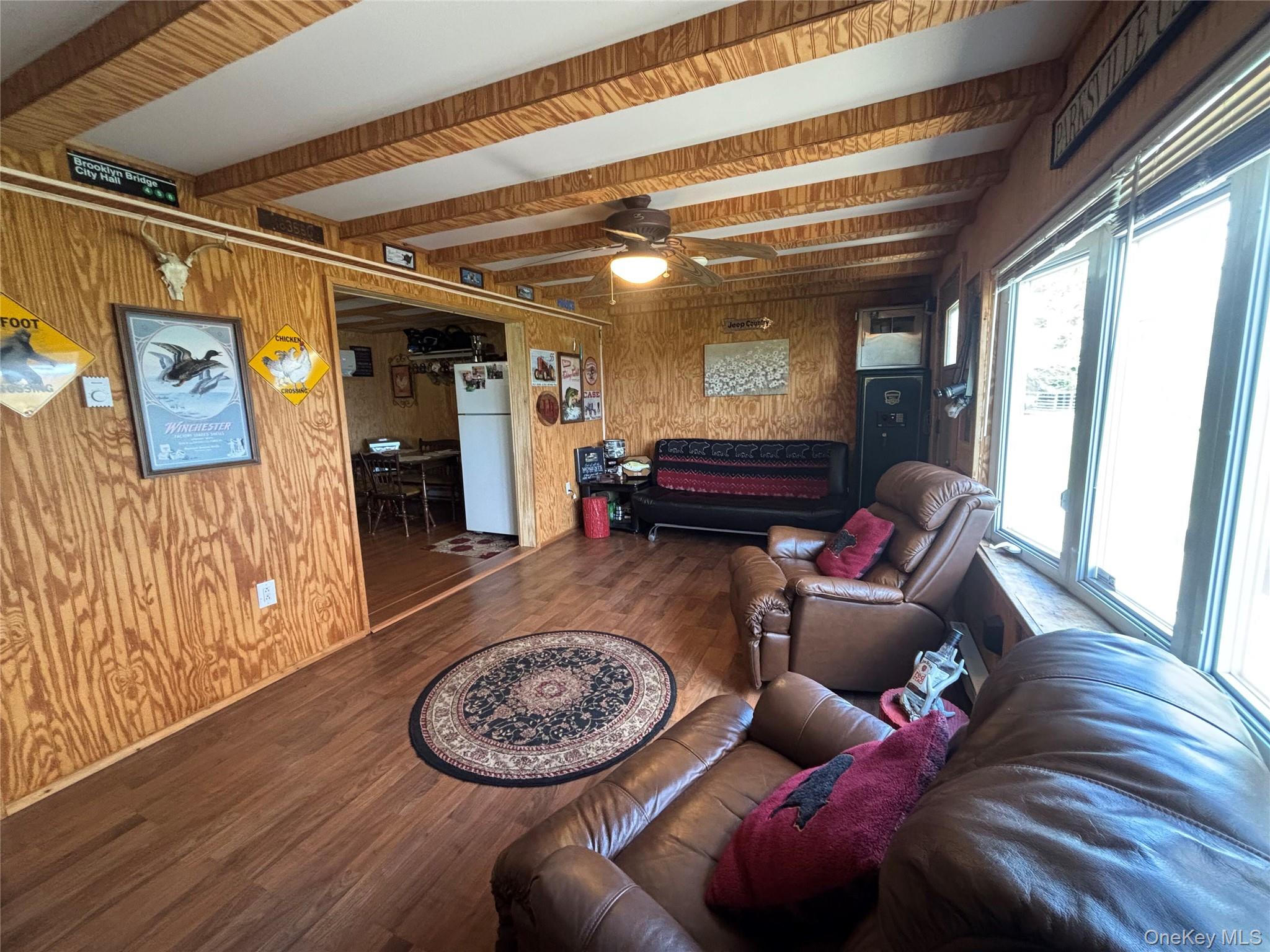 48 Mullen Road Parksville, NY 12768 - Photo 11 of 35 a living room with furniture and a wooden floor