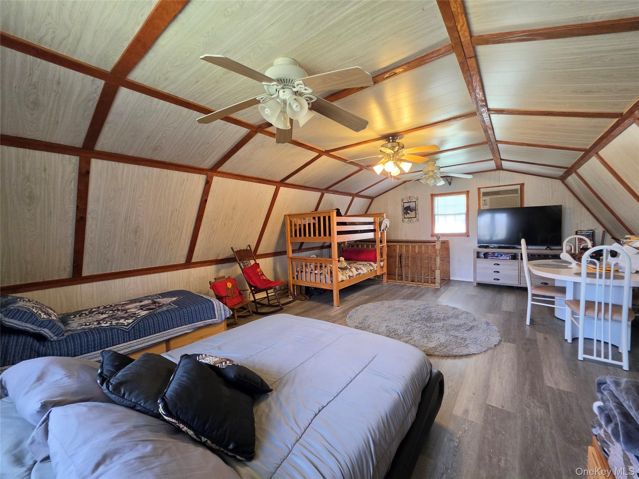 48 Mullen Road Parksville, NY 12768 - Photo 18 of 35 a bedroom with bed and window