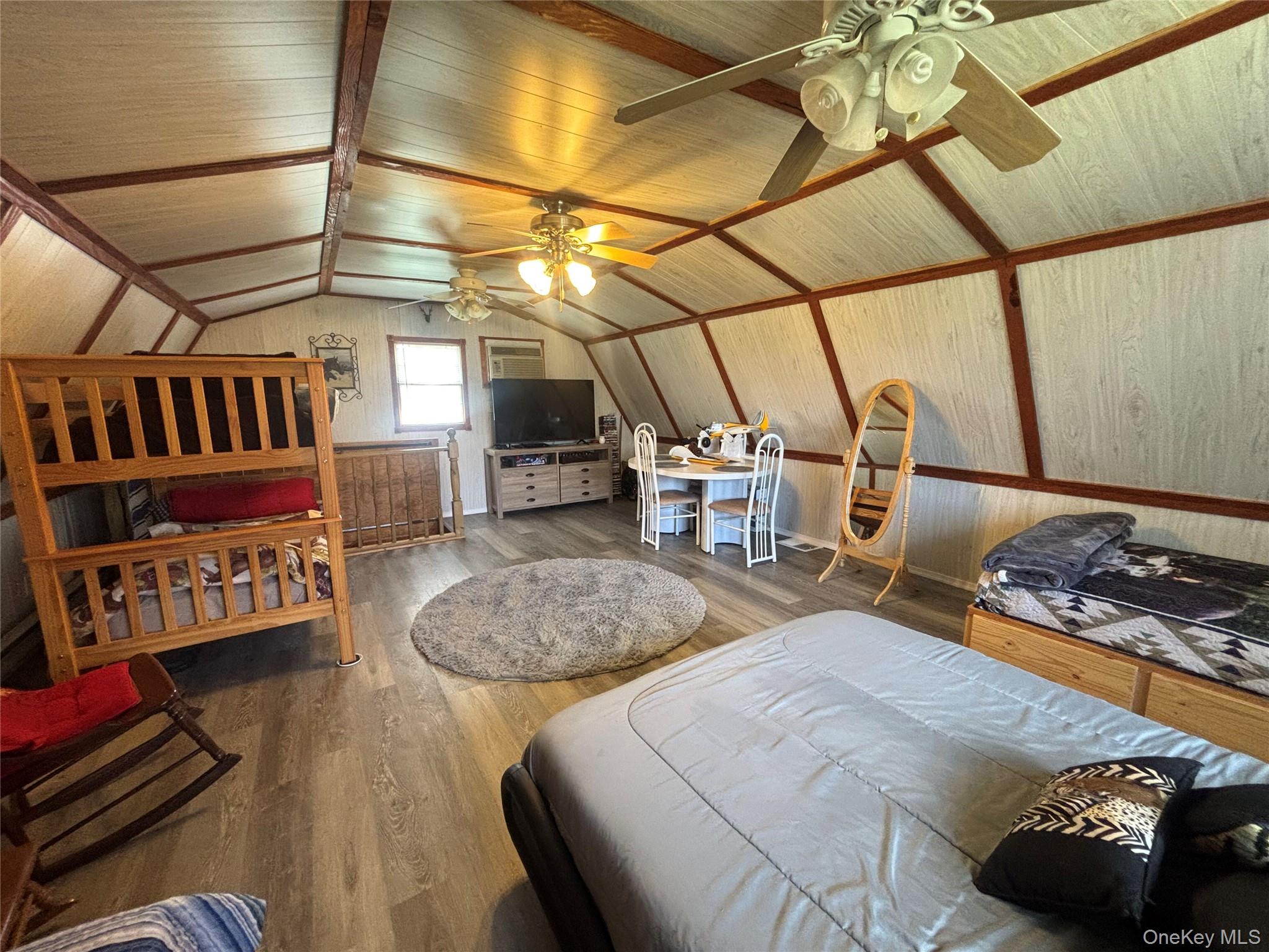 48 Mullen Road Parksville, NY 12768 - Photo 19 of 35 a bedroom with furniture and a bed