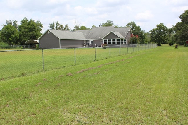 7164 Goodall Mill Road Macon, GA 31216 - Photo 4 of 12 a view of an outdoor space and basketball court