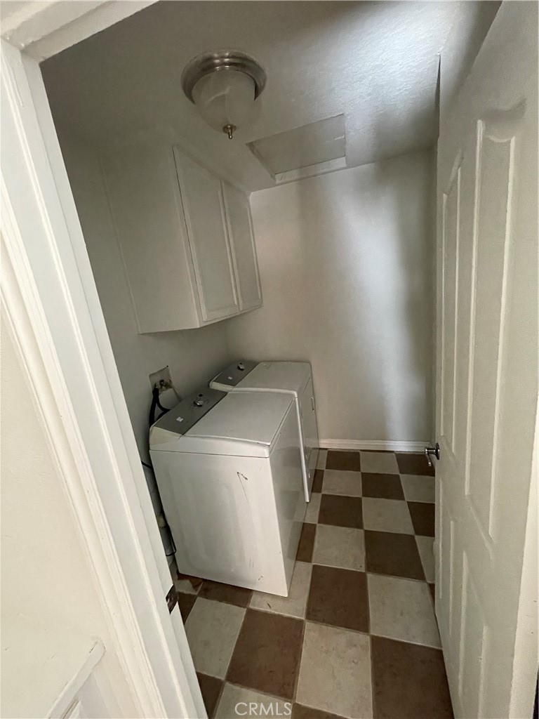 8354 White Road Phelan, CA 92371 - Photo 13 of 43 a room with a black white checkered floor with a black white checkered floor