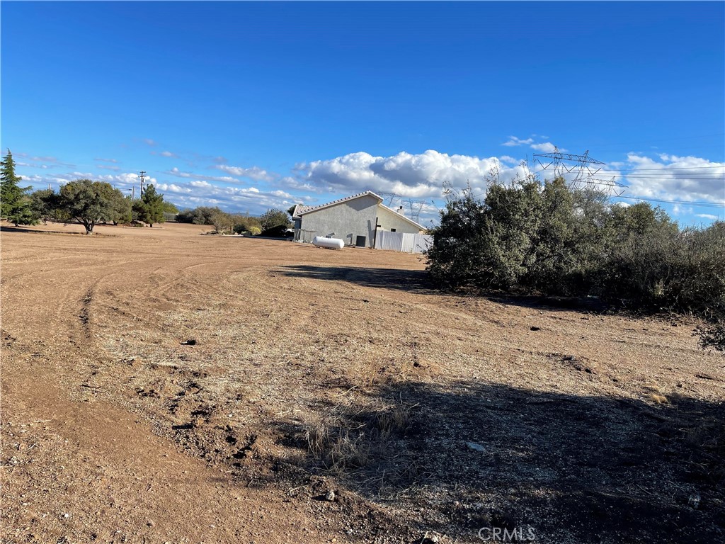 8354 White Road Phelan, CA 92371 - Photo 15 of 43 Main house side yard view looking east