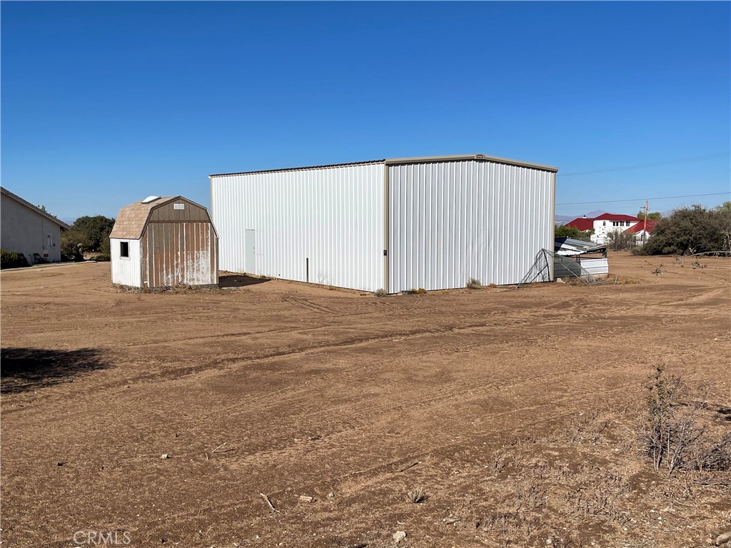8354 White Road Phelan, CA 92371 - Photo 21 of 43 50'X40' metal Butler bldg. looking northwest adjacent to the main house
