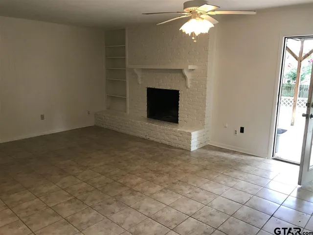 an empty room with windows