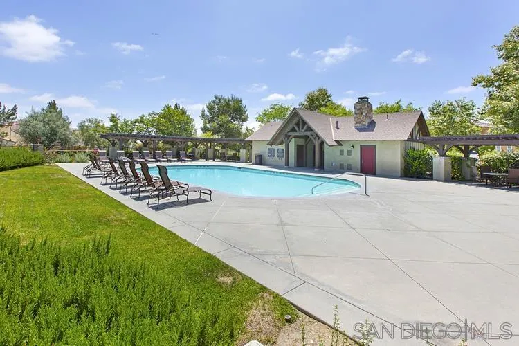 16697 Nicole Ridge Road San Diego, CA 92127 - Photo 31 of 34 a front view of a house with a yard