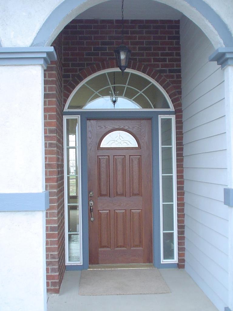3141 Scoon Road Sunnyside, WA 98944 - Photo 8 of 9 a front view of a house with a glass door