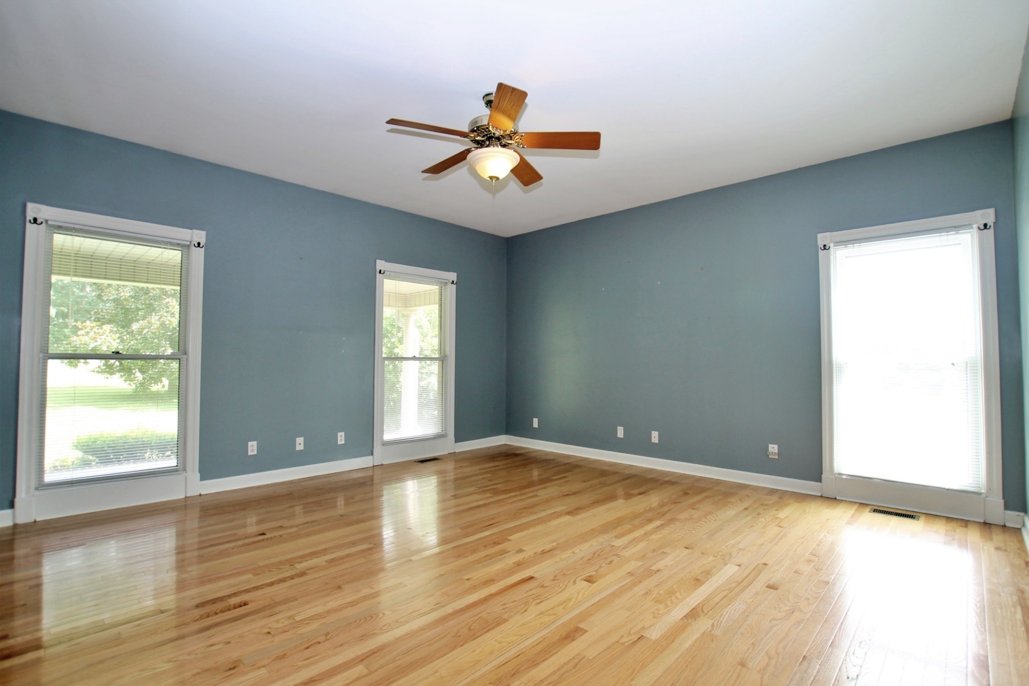 4181 Sandy Springs Road Springfield, TN 37172 - Photo 12 of 44 a view of empty room with wooden floor and fan