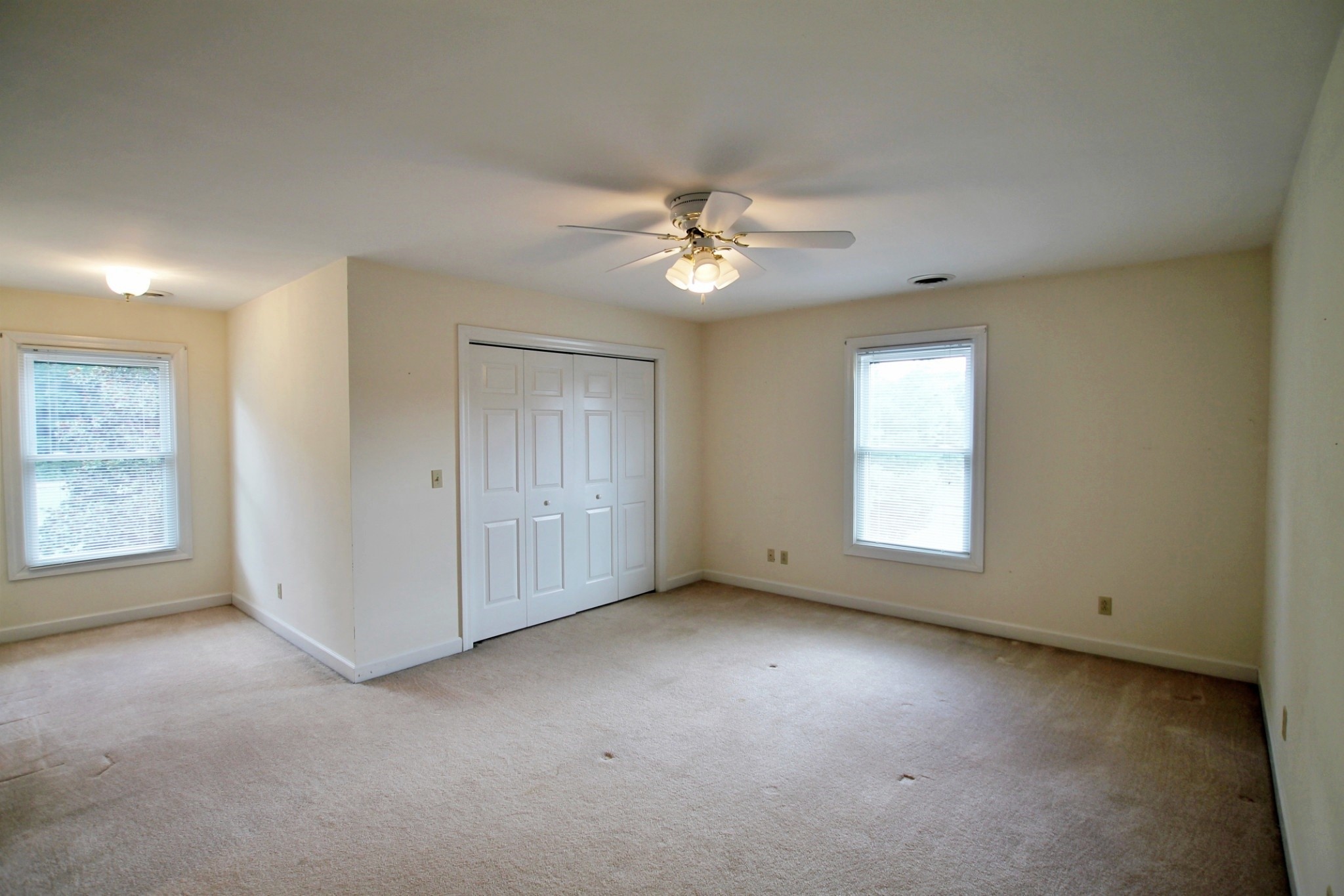 4181 Sandy Springs Road Springfield, TN 37172 - Photo 17 of 44 an empty room with a window and a ceiling fan