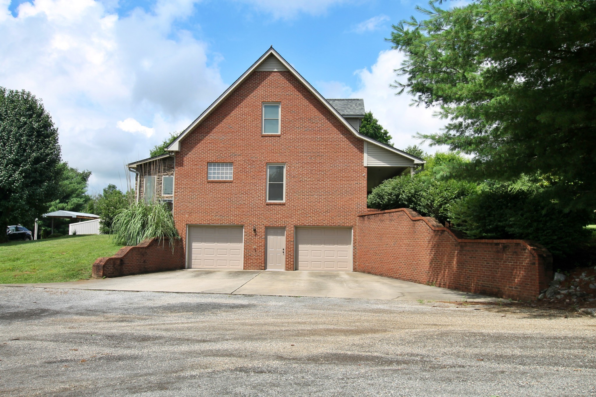 4181 Sandy Springs Road Springfield, TN 37172 - Photo 31 of 44 a front view of a house with a garden