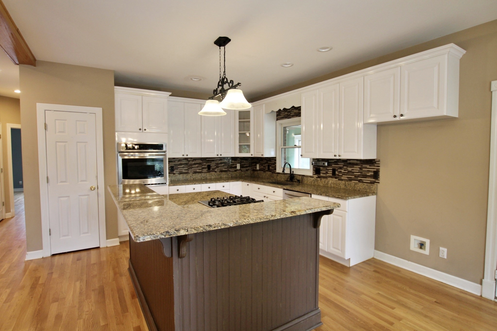4181 Sandy Springs Road Springfield, TN 37172 - Photo 7 of 44 a kitchen with stainless steel appliances granite countertop a sink stove and refrigerator