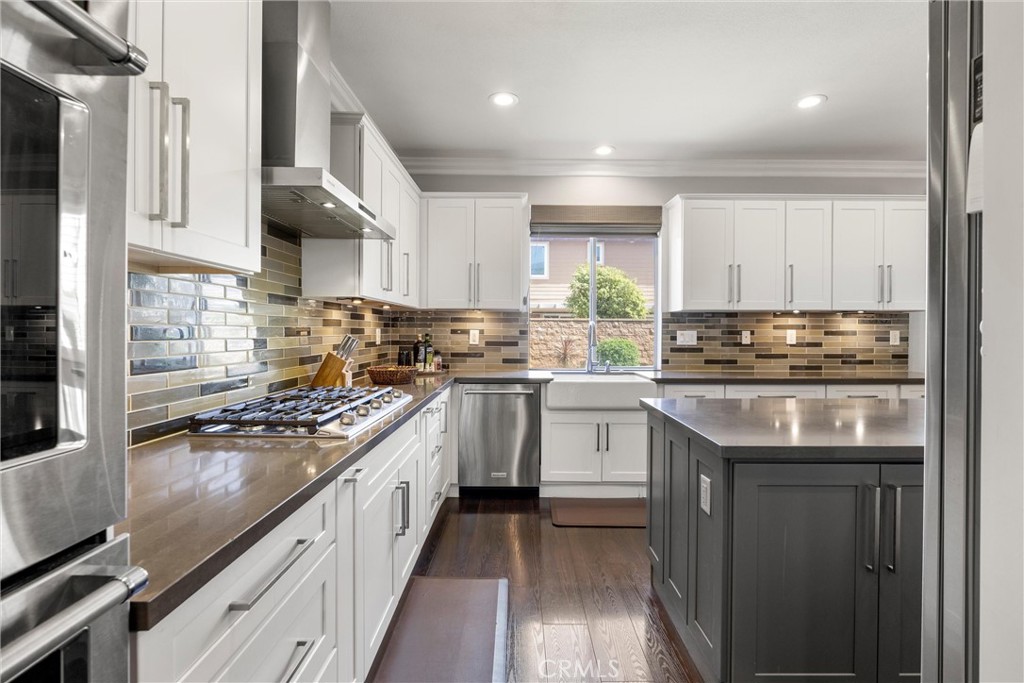 7133 Brisas Court Rancho Cucamonga, CA 91739 - Photo 15 of 70 DUAL OVEN, GAS RANGE, FARM SINK