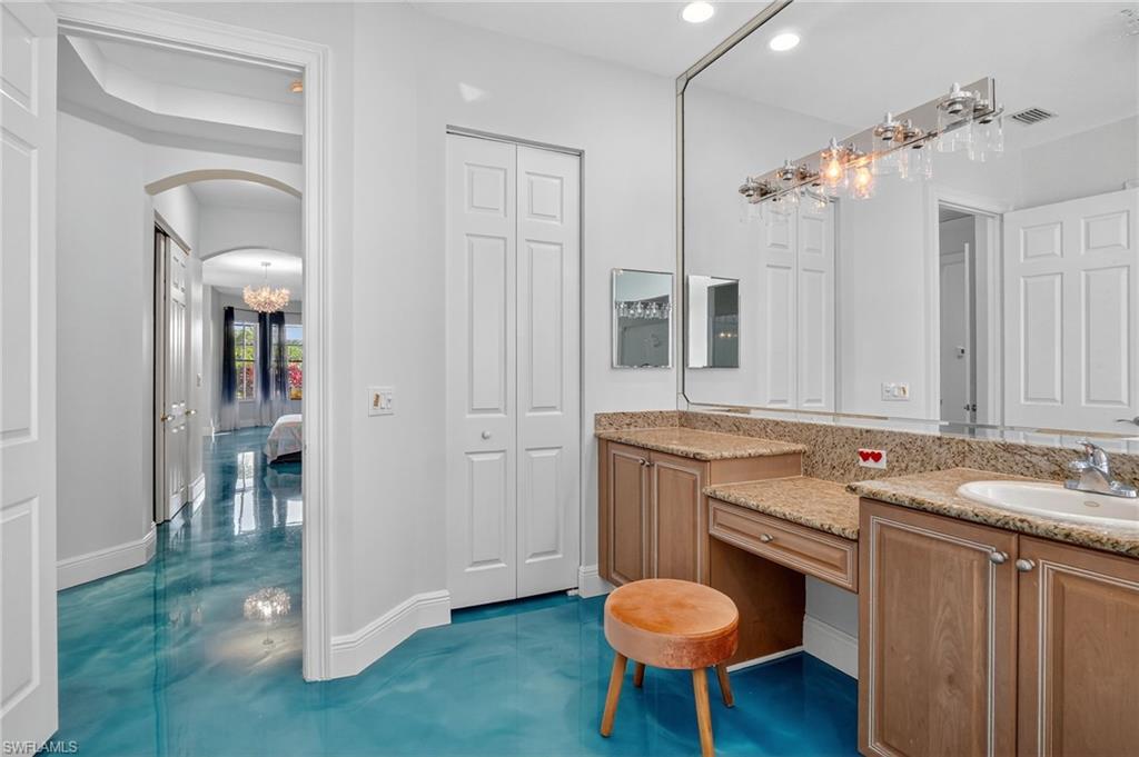 2234 Campestre Terrace Naples, FL 34119 - Photo 23 of 48 Full bathroom with a closet, vanity, recessed lighting, and ensuite bath