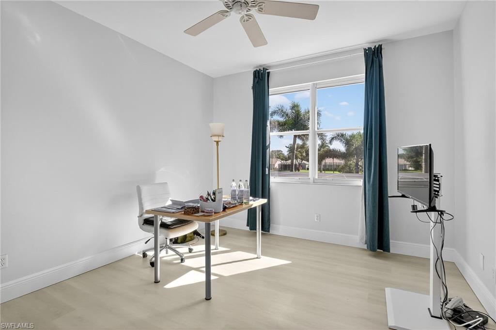 2234 Campestre Terrace Naples, FL 34119 - Photo 31 of 48 Office area with light wood-style floors and baseboards
