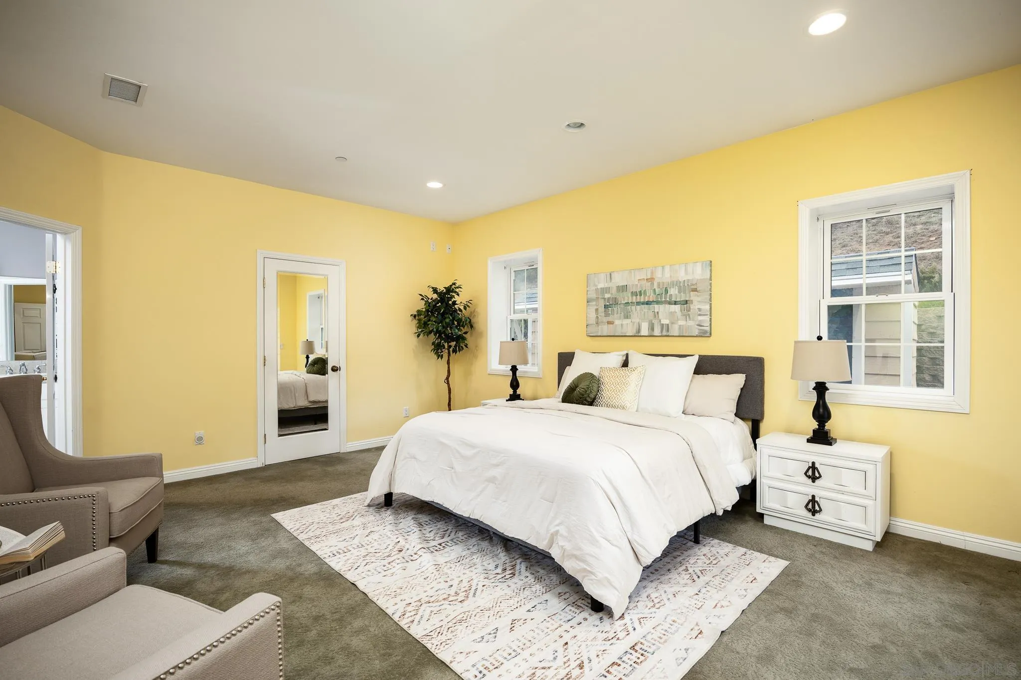 7570 Corte Madera Road Pine Valley, CA 91962 - Photo 12 of 53 a spacious bedroom with a bed and glass windows