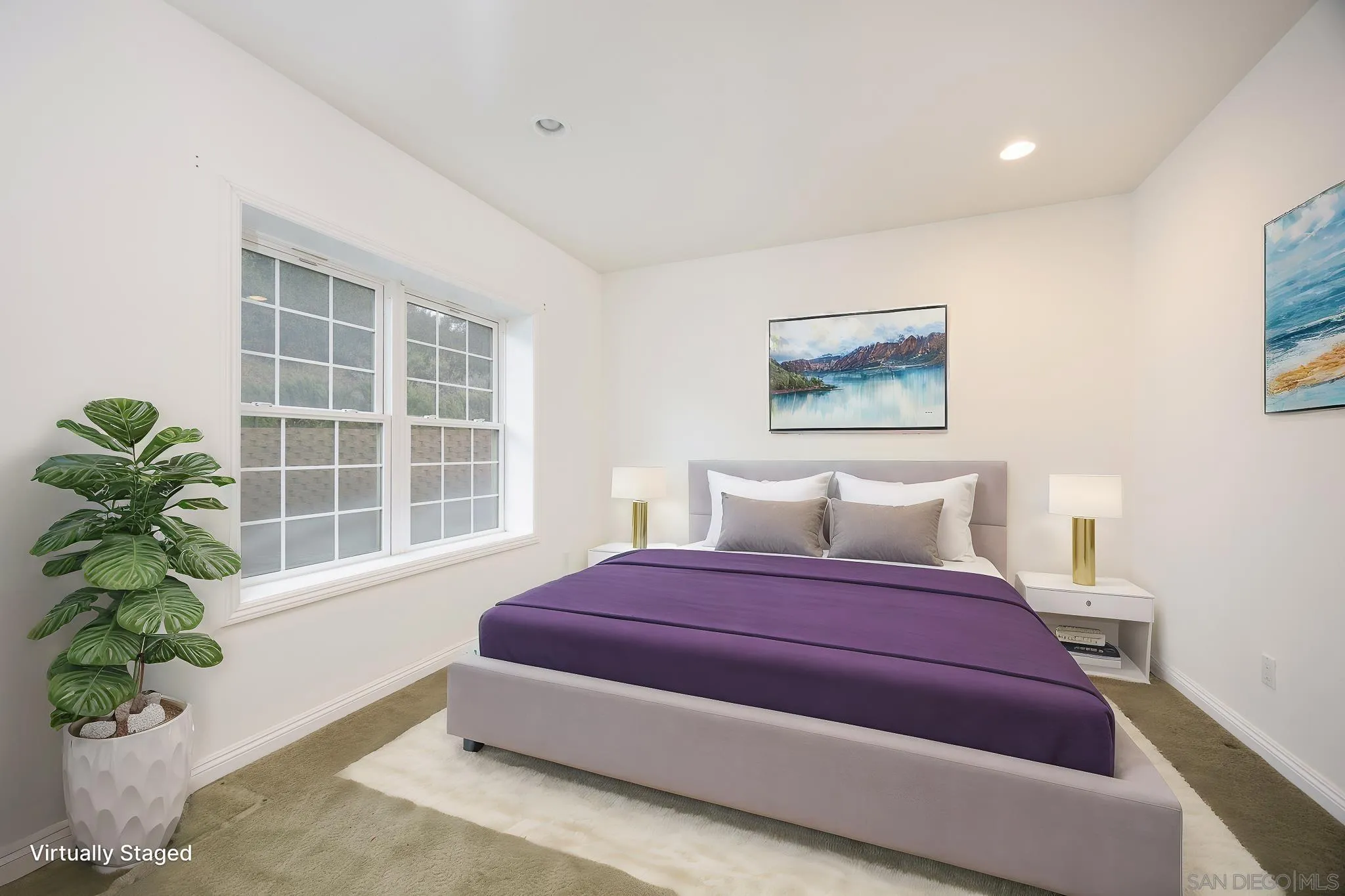 7570 Corte Madera Road Pine Valley, CA 91962 - Photo 19 of 53 a bedroom with a large bed and a potted plant