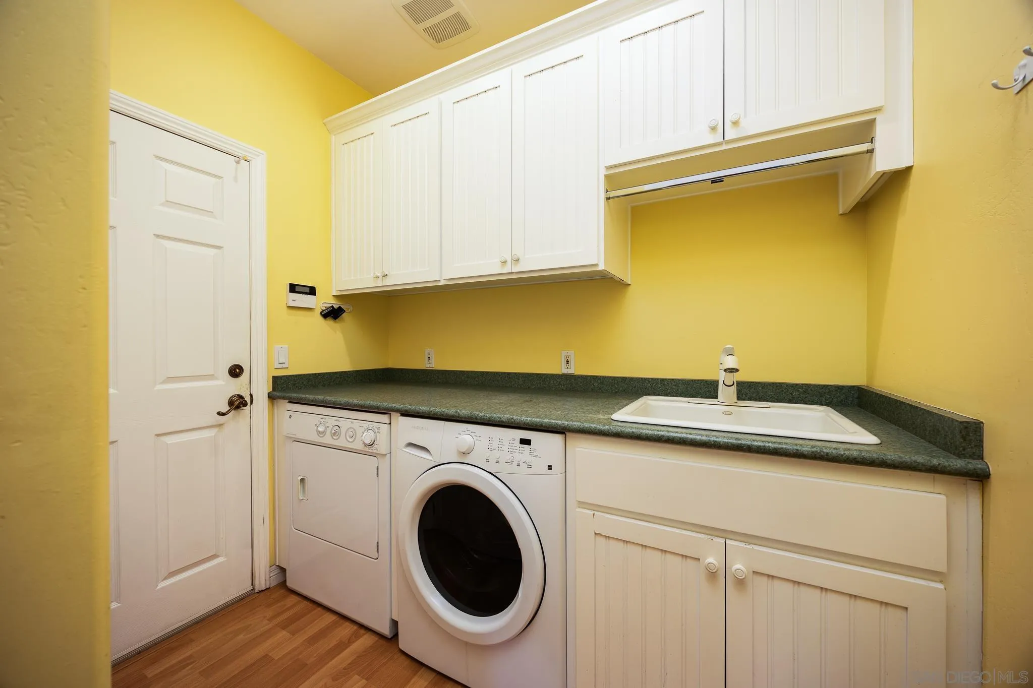 7570 Corte Madera Road Pine Valley, CA 91962 - Photo 20 of 53 a utility room with dryer and washer