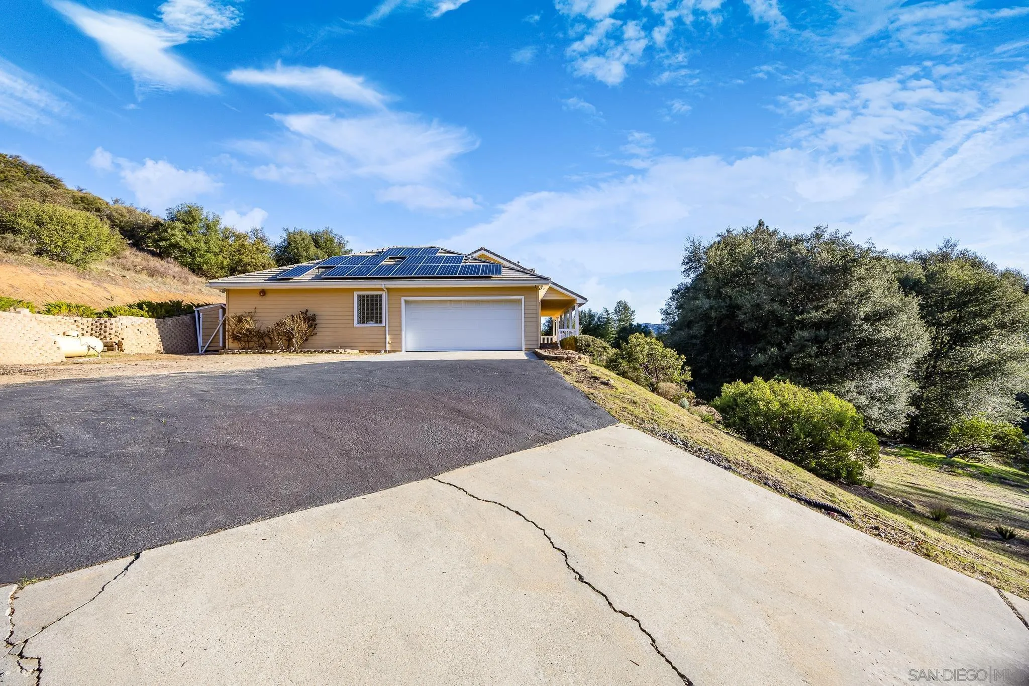 7570 Corte Madera Road Pine Valley, CA 91962 - Photo 30 of 53 a view of a house with a street