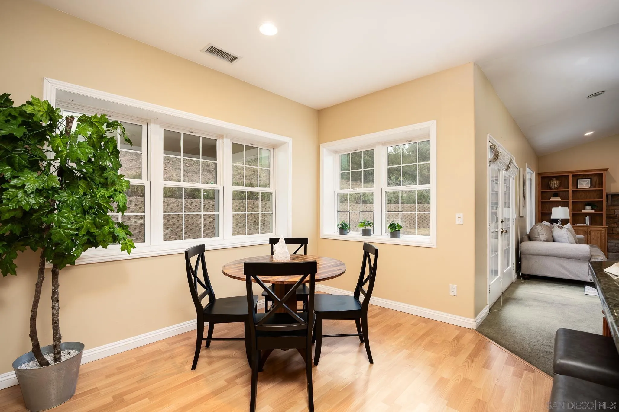 7570 Corte Madera Road Pine Valley, CA 91962 - Photo 8 of 53 a view of a dining room with furniture window and wooden floor