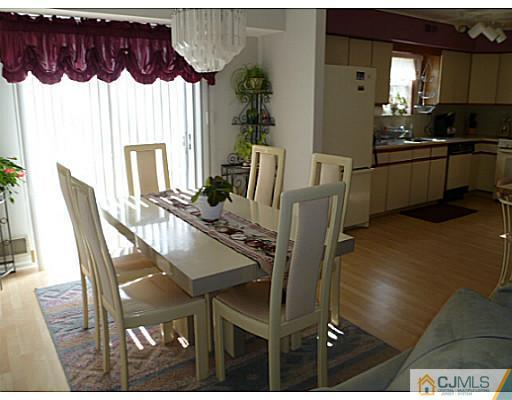 116 Almond Road Freehold, NJ 07728 - Photo 6 of 14 a dining room with furniture and window