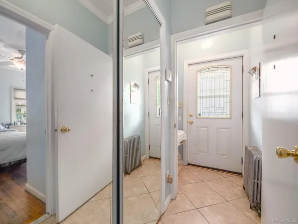 a bathroom with a sink toilet and a mirror