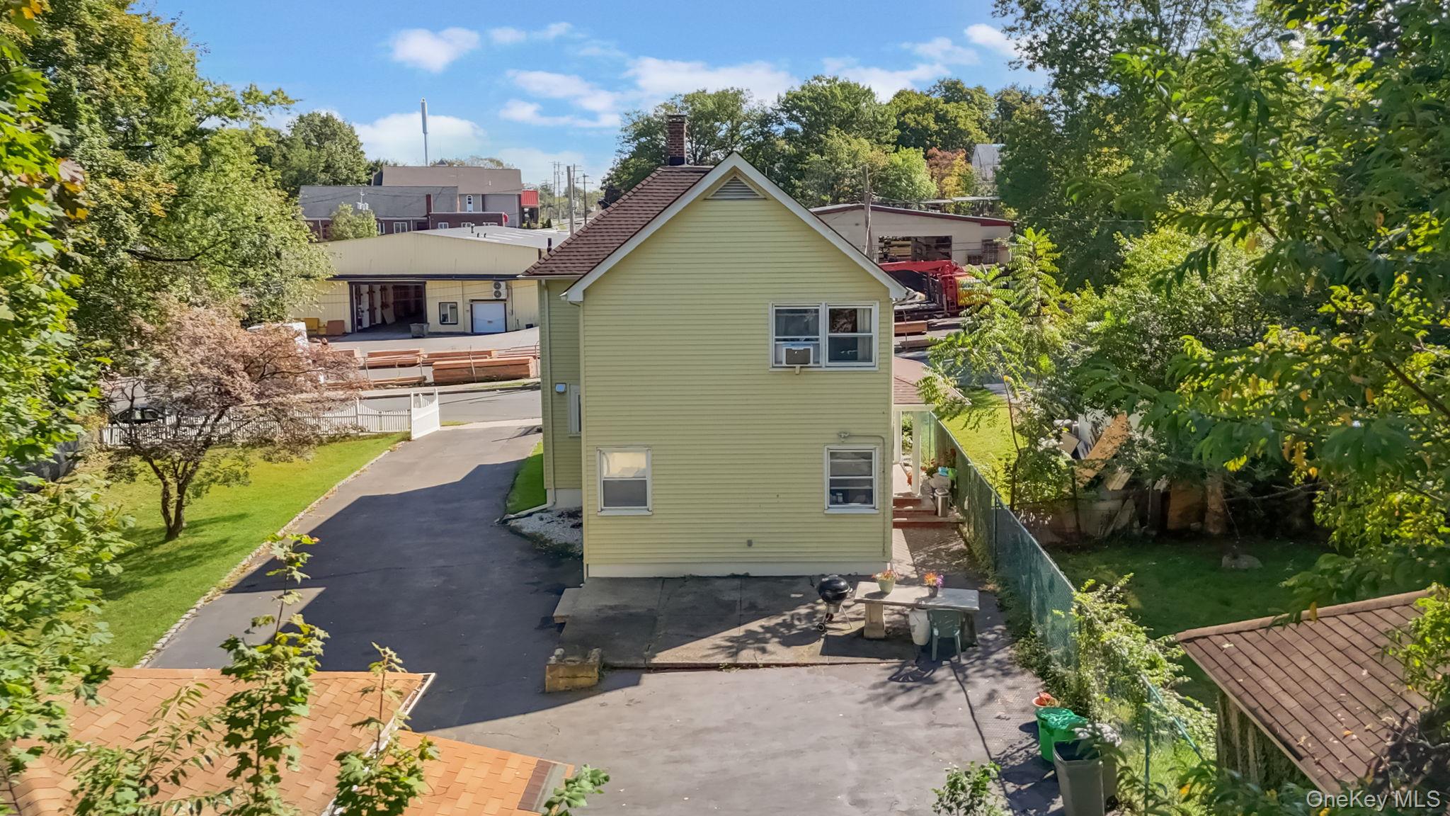 3 South Myrtle Avenue Spring Valley, NY 10977 - Photo 32 of 40 Back of property with a patio area and a balcony