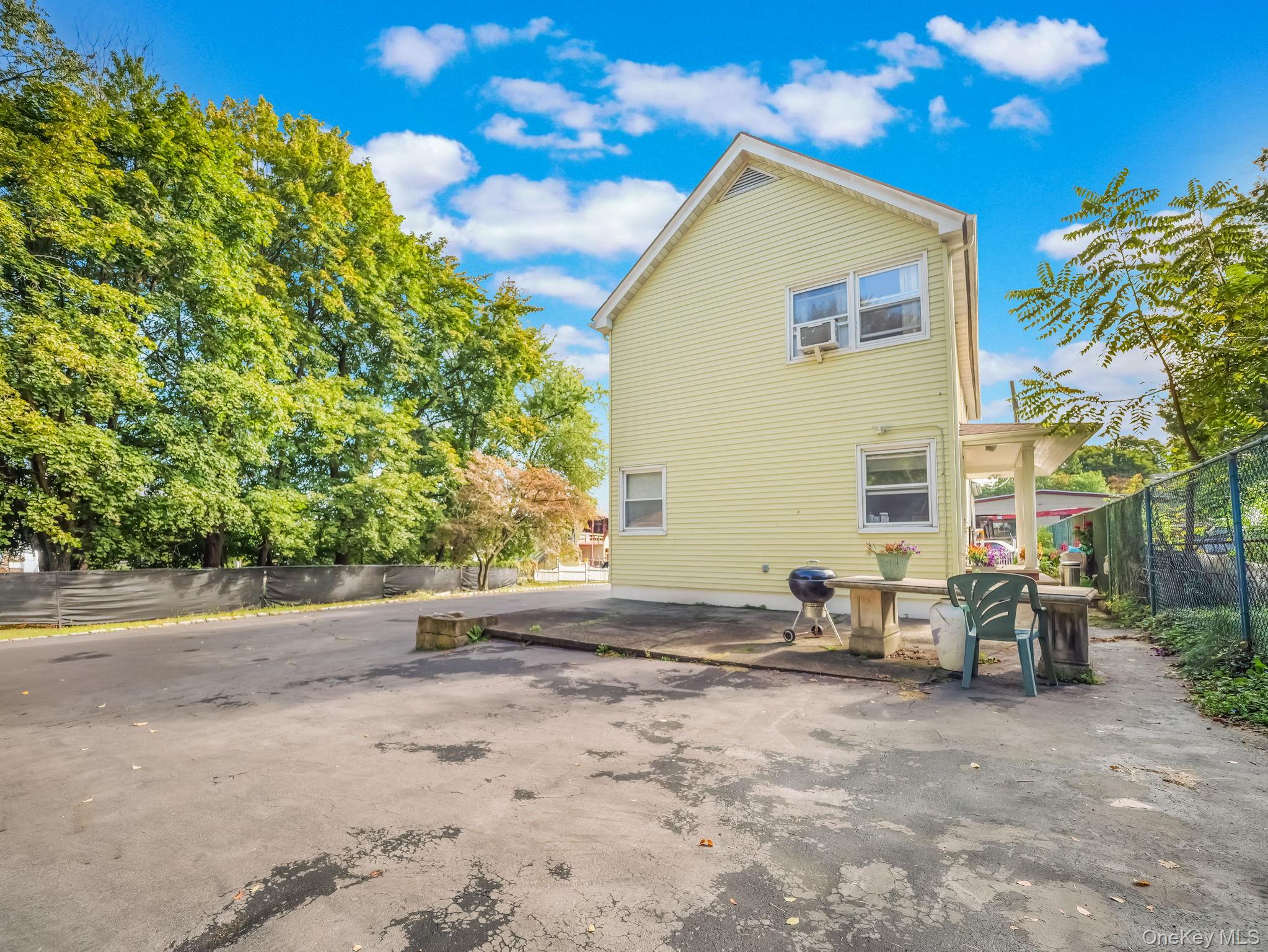 3 South Myrtle Avenue Spring Valley, NY 10977 - Photo 40 of 40 Rear view of house with a patio area