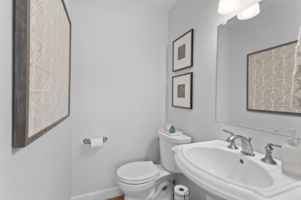 77 Forest Drive Holden, MA 01520 - Photo 11 of 27 a bathroom with a sink mirror and toilet