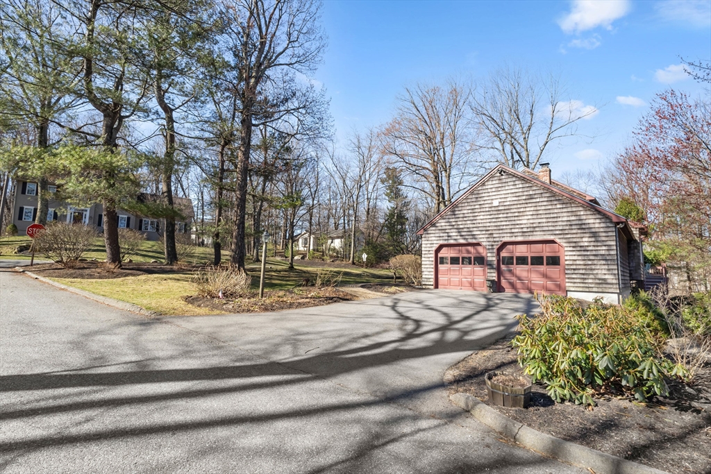 77 Forest Drive Holden, MA 01520 - Photo 3 of 27 a view of street with apartments with trees