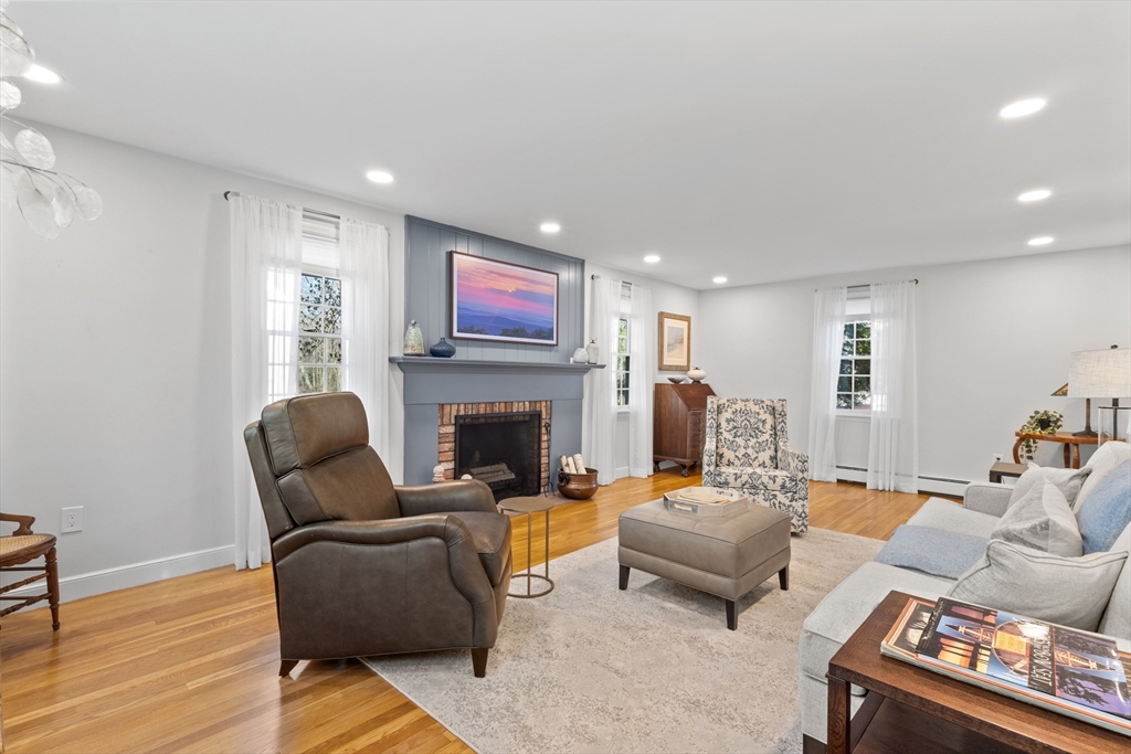 77 Forest Drive Holden, MA 01520 - Photo 6 of 27 a living room with furniture and a fireplace