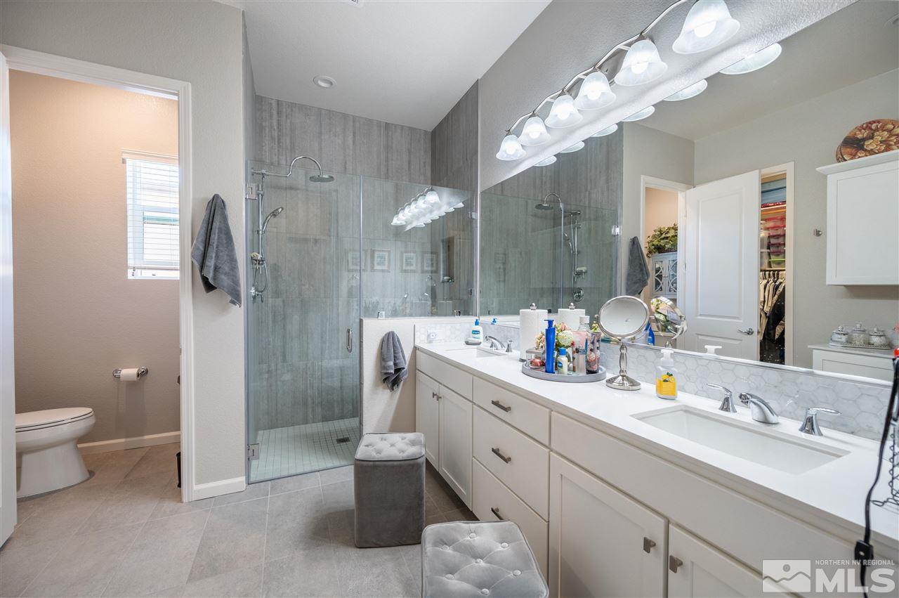 2522 Titanium Crest Drive Reno, NV 89521 - Photo 12 of 23 a bathroom with a sink a toilet and shower