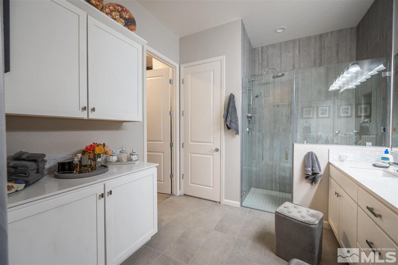 2522 Titanium Crest Drive Reno, NV 89521 - Photo 13 of 23 a bathroom with a sink a toilet and shower