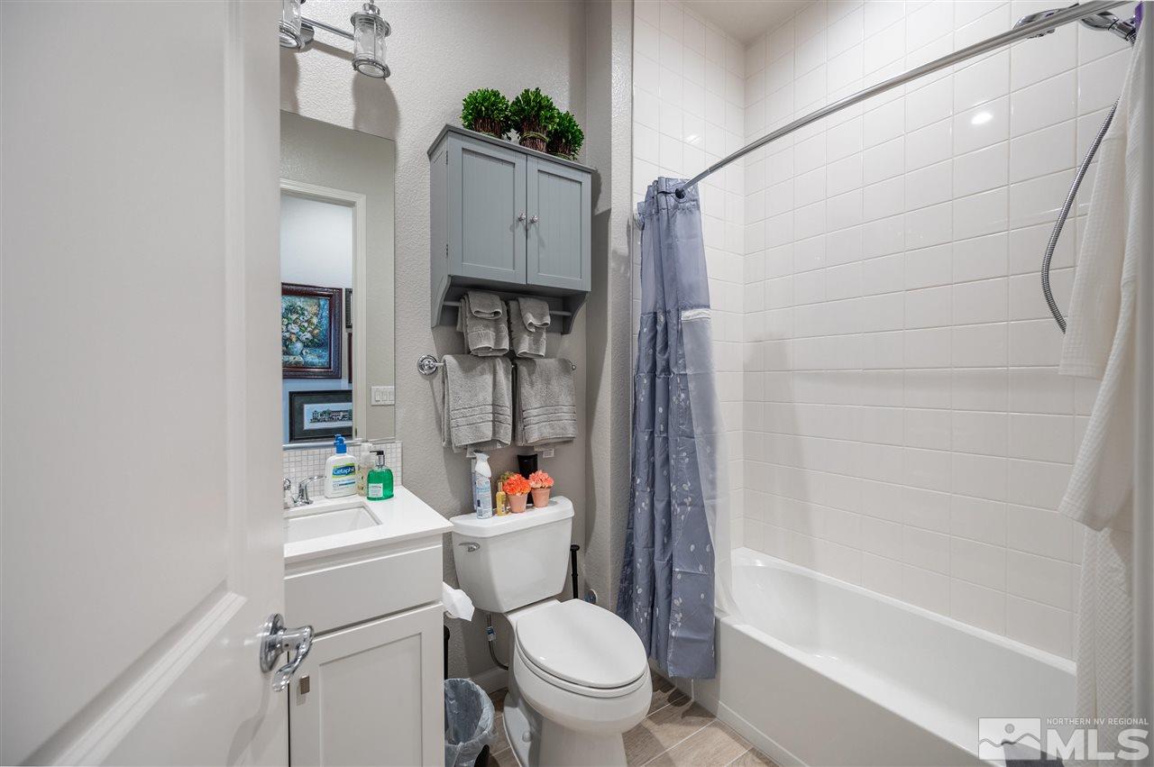2522 Titanium Crest Drive Reno, NV 89521 - Photo 16 of 23 a bathroom with a sink toilet and shower
