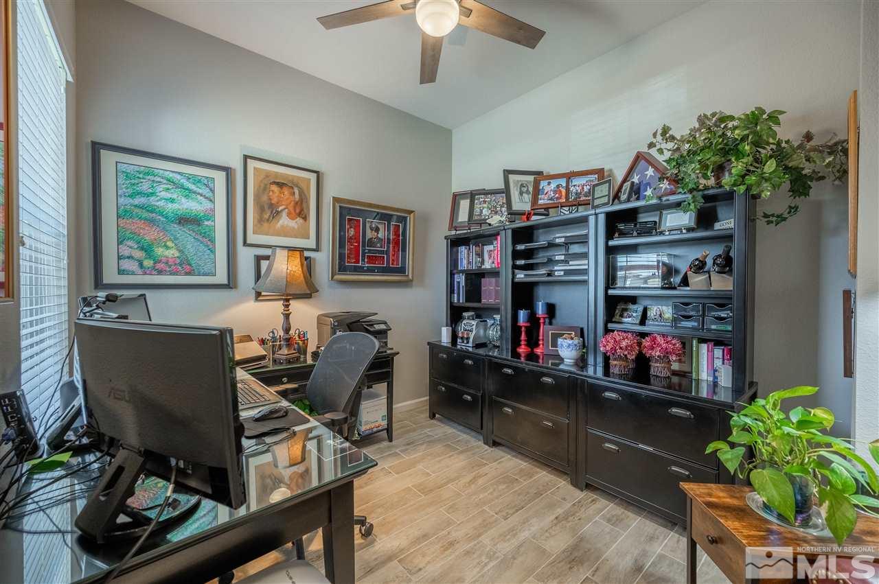 2522 Titanium Crest Drive Reno, NV 89521 - Photo 18 of 23 a work room with furniture and a potted plant