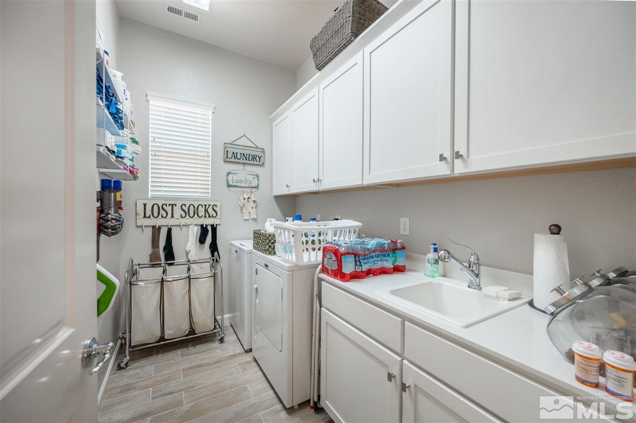 2522 Titanium Crest Drive Reno, NV 89521 - Photo 19 of 23 a kitchen with a sink cabinets and window