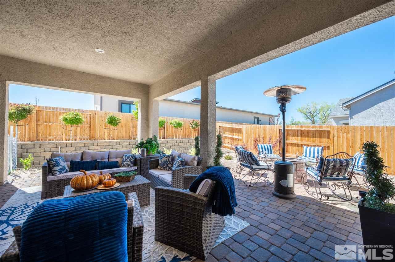2522 Titanium Crest Drive Reno, NV 89521 - Photo 20 of 23 a living room with furniture and large windows
