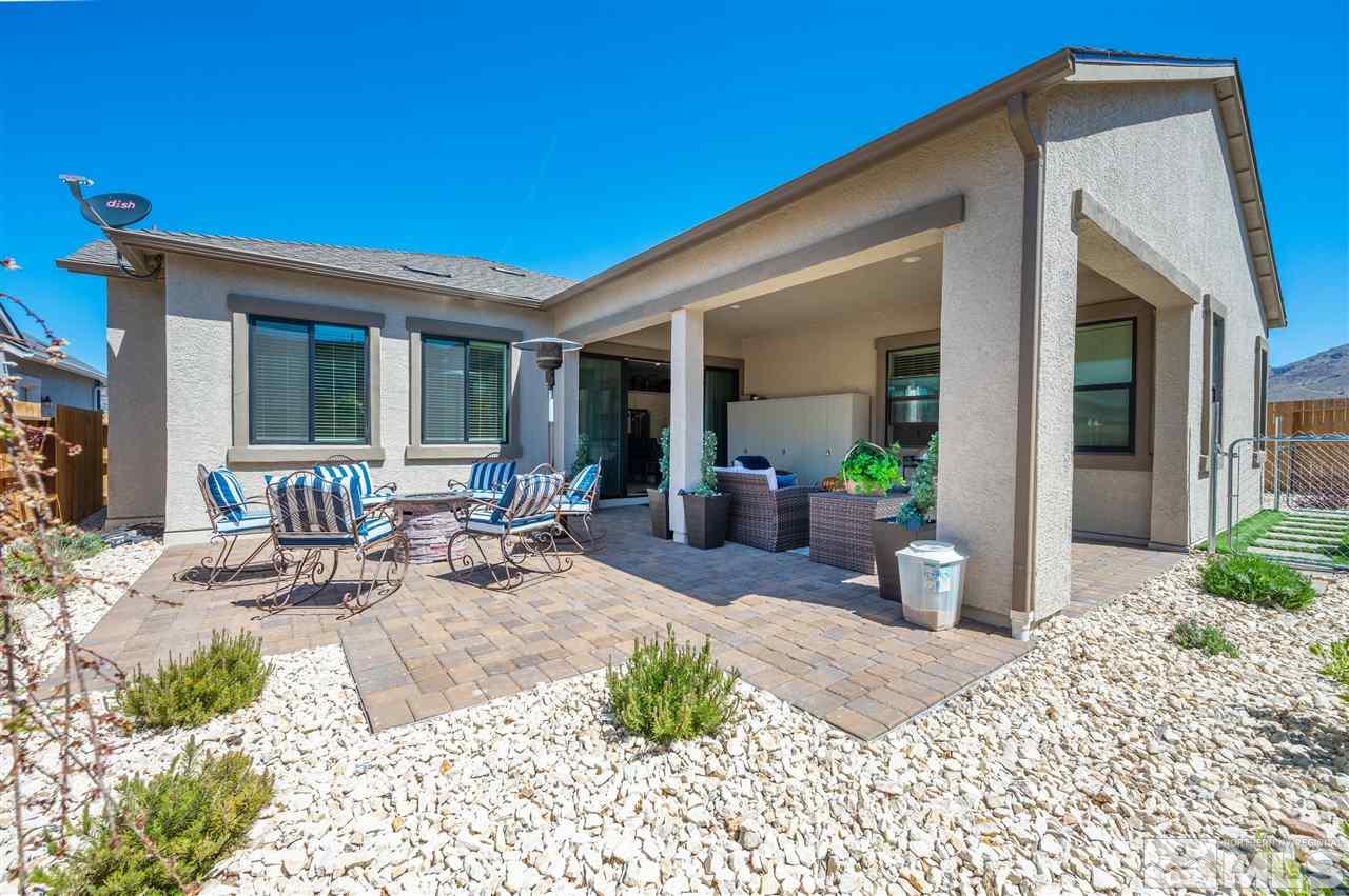 2522 Titanium Crest Drive Reno, NV 89521 - Photo 21 of 23 a view of a dinning table and chairs in patio of the house