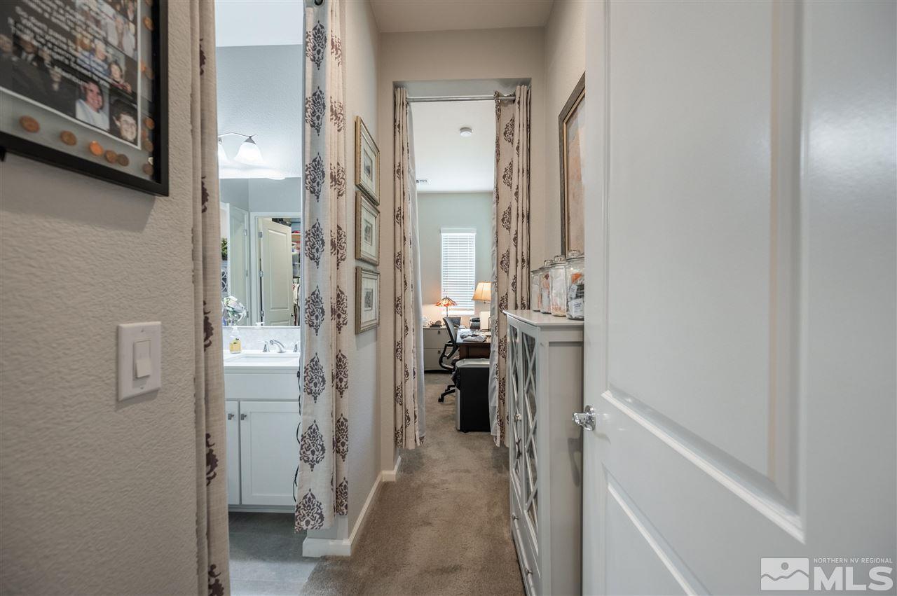 2522 Titanium Crest Drive Reno, NV 89521 - Photo 10 of 23 a view of a bathroom with a sink and shower