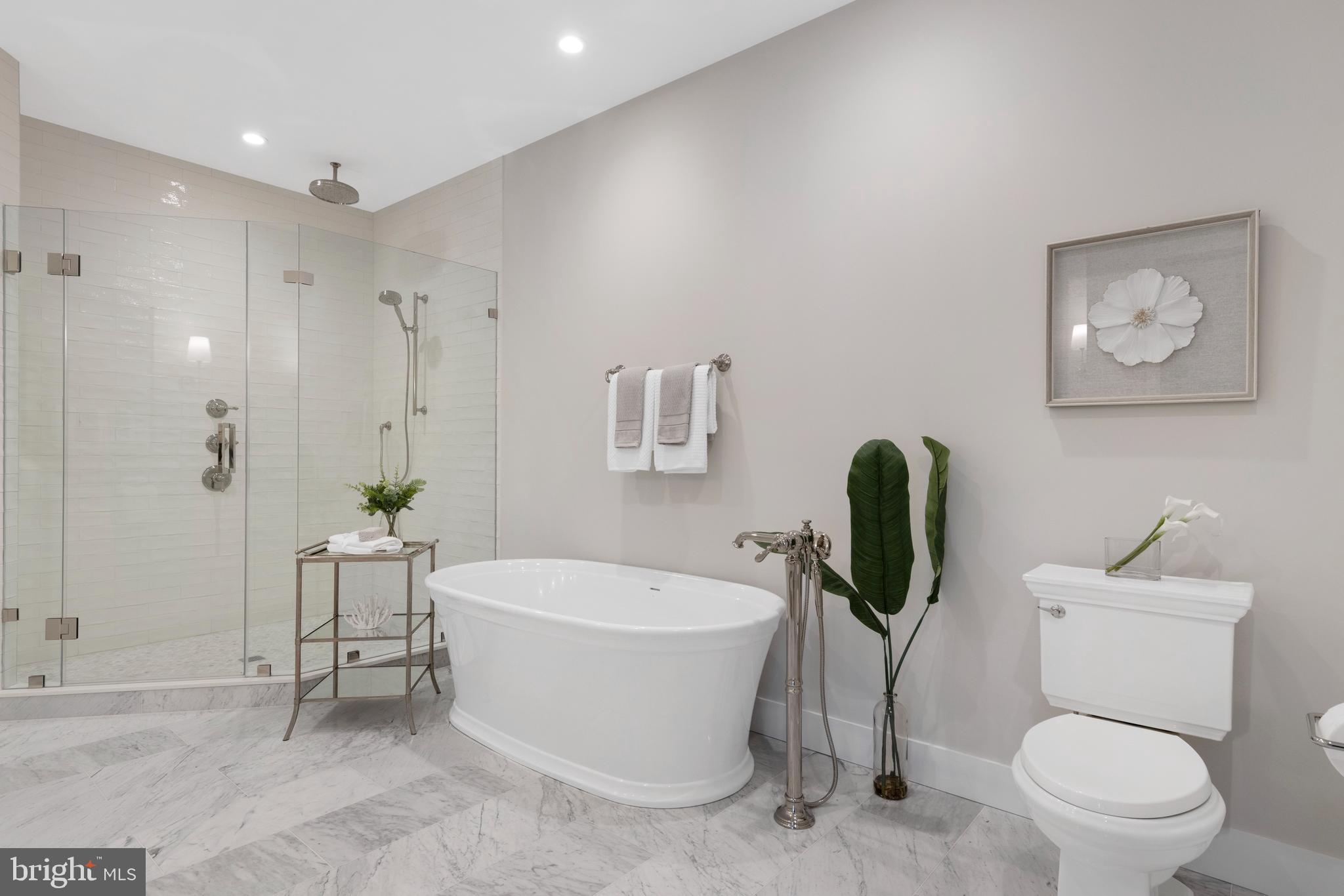 427 East Lancaster Avenue, Unit 2201 Wayne, PA 19087 - Photo 33 of 46 a bathroom with a toilet and a bathtub