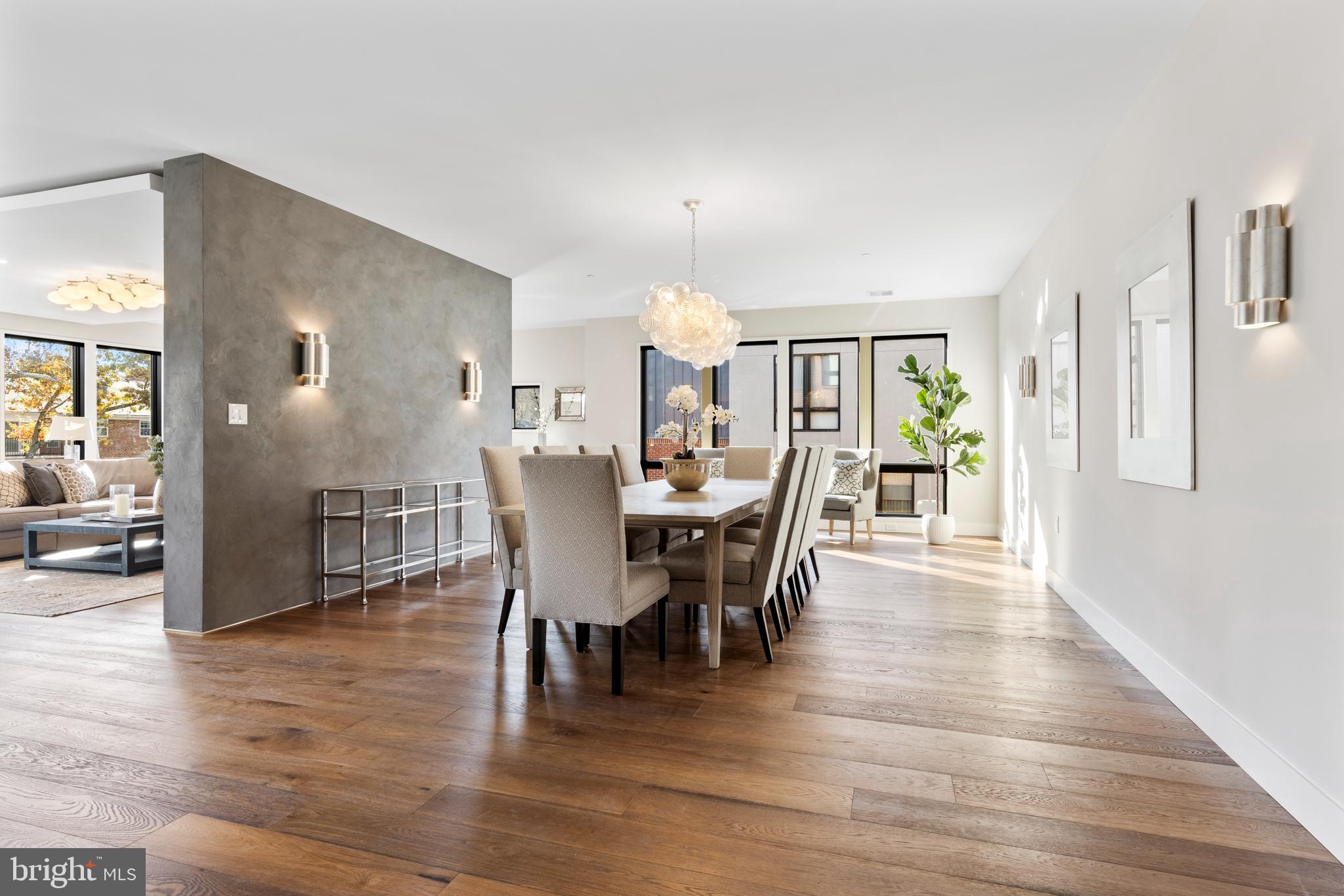 427 East Lancaster Avenue, Unit 2201 Wayne, PA 19087 - Photo 9 of 46 a view of a dining room with furniture and wooden floor