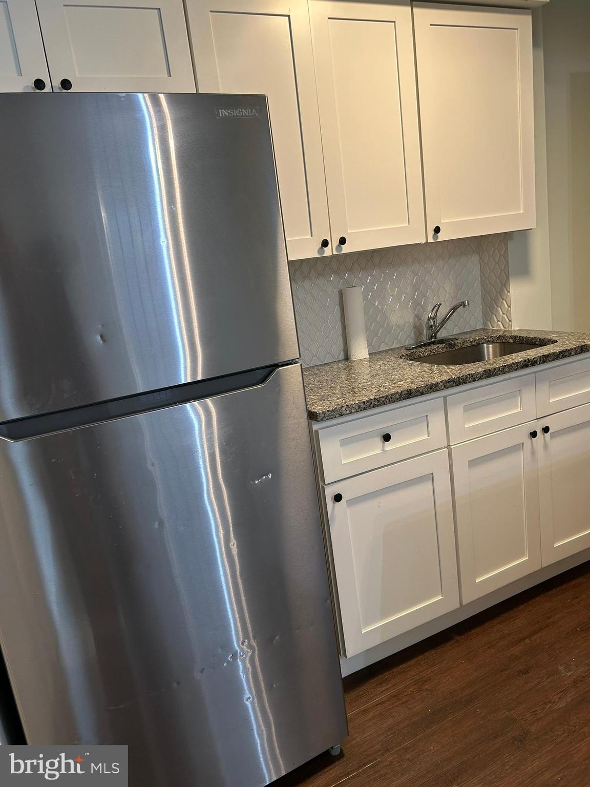 6643 Church Lane Upper Darby, PA 19082 - Photo 5 of 11 a view of cabinets and wooden floor