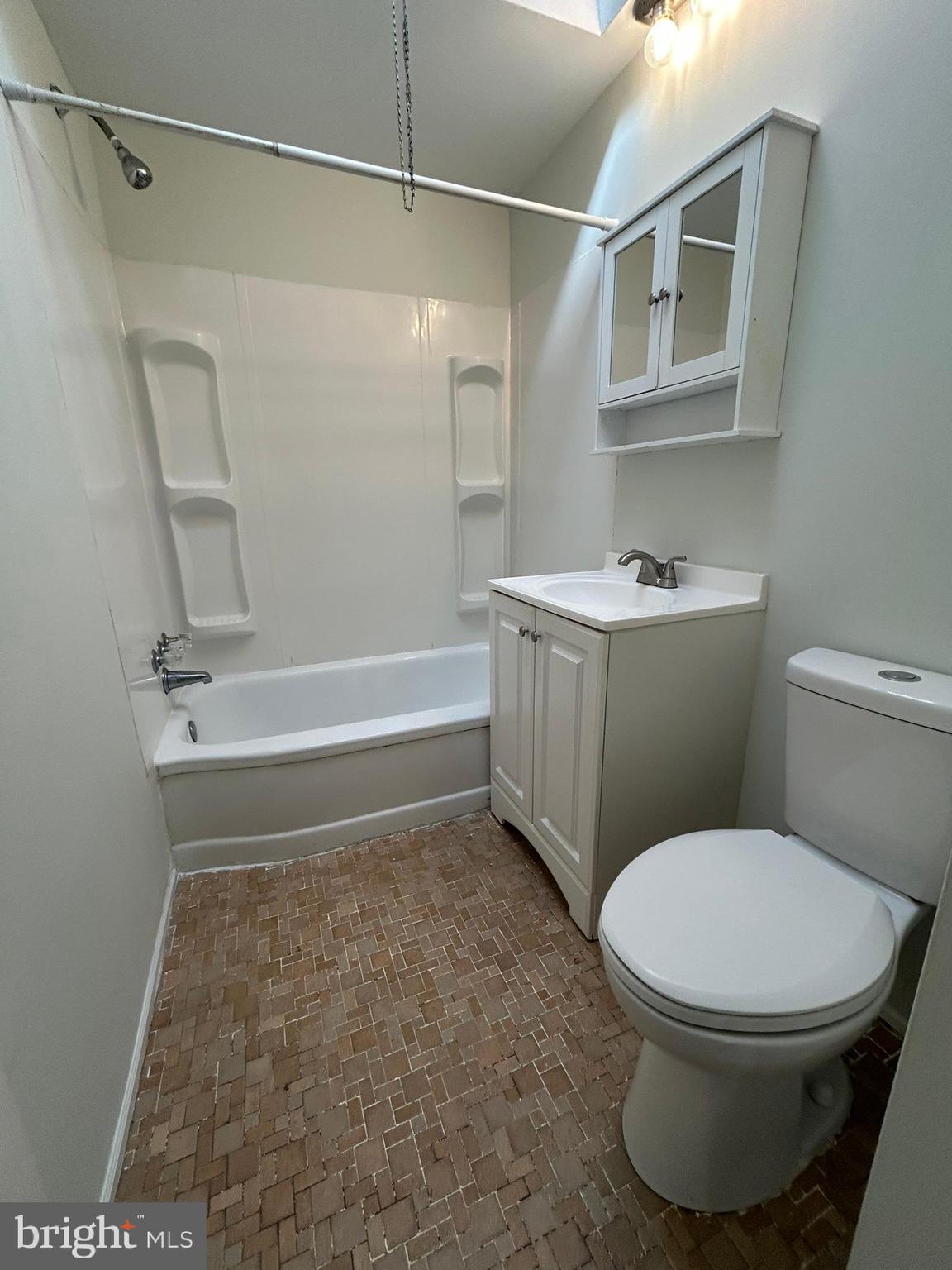 6643 Church Lane Upper Darby, PA 19082 - Photo 9 of 11 a bathroom with a sink a toilet and shower