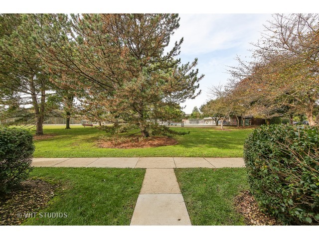 214 East Bailey Road, Unit A Naperville, IL 60565 - Photo 10 of 10 a view of building with outdoor space