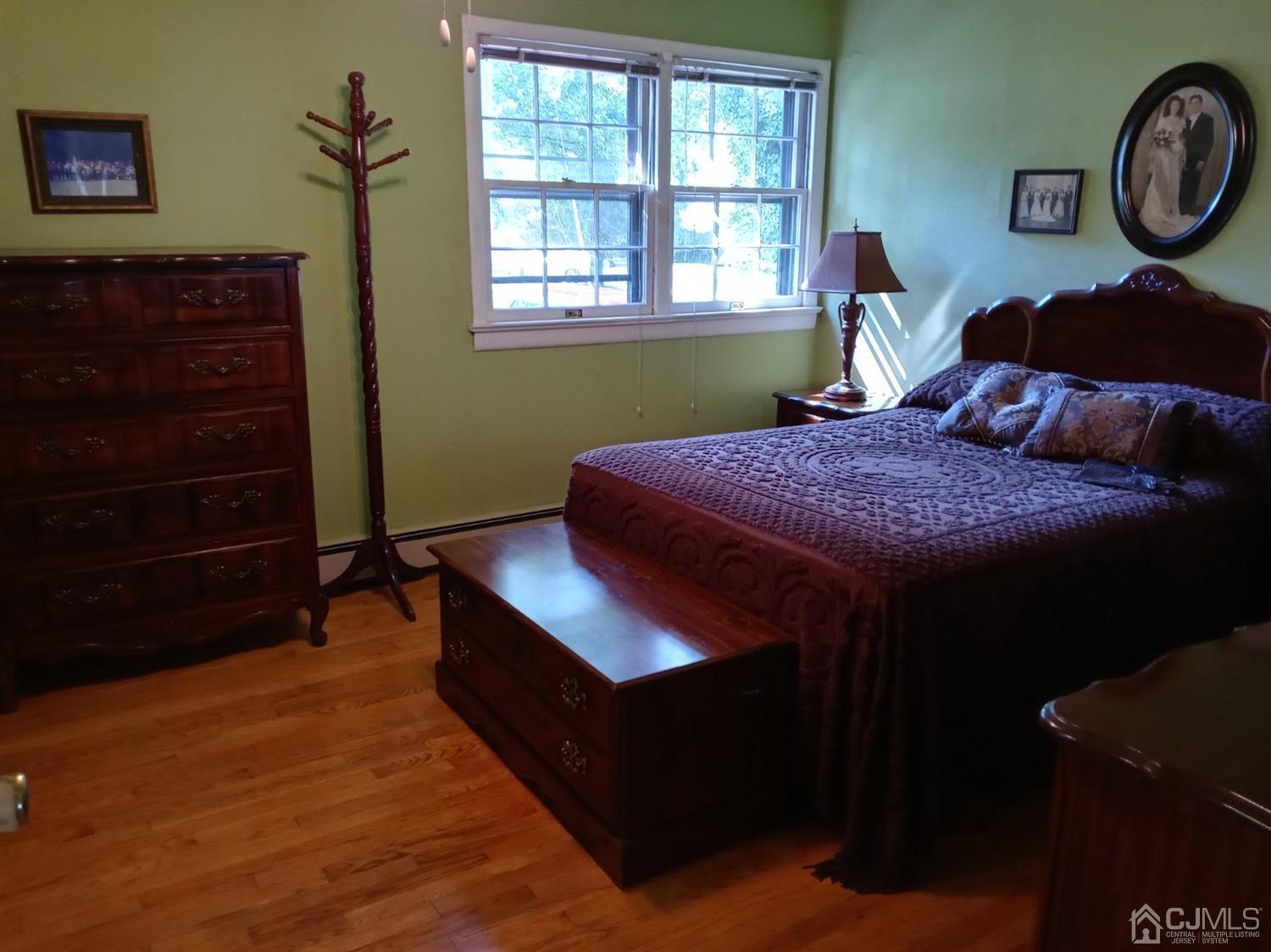 62 Wilcox Road New Brunswick, NJ 08901 - Photo 14 of 35 a bedroom with a bed and a closet