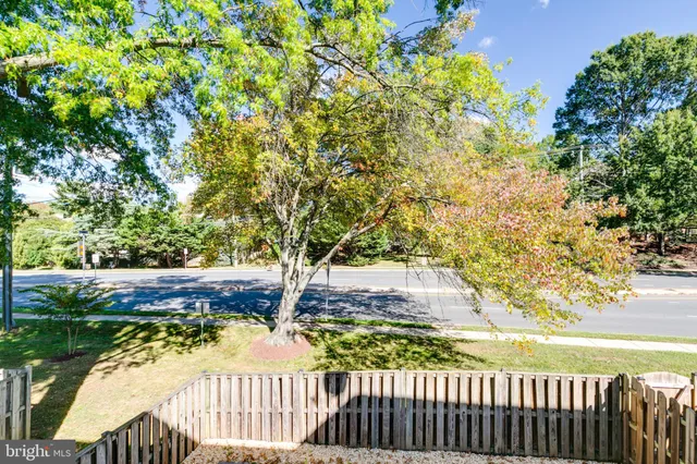 a view of a wooden fence