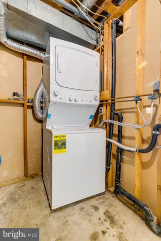 a view of a house with a wooden deck