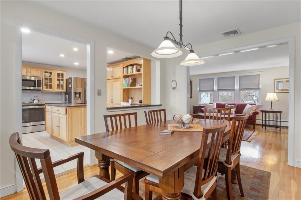 23 Glover Road Needham, MA 02494 - Photo 14 of 40 a view of a dining room with furniture